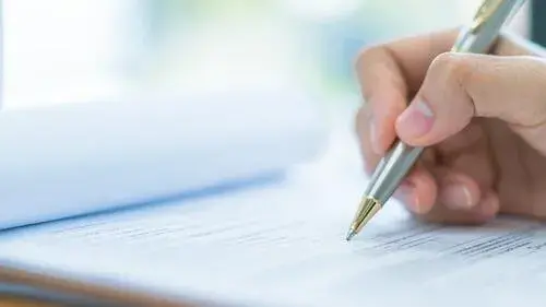 Person filling out form