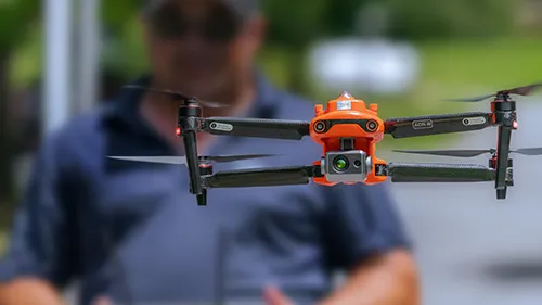 A man operating a drone.