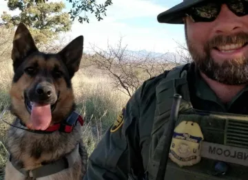 In Memoriam photo of K9 Nestor with handler, CBP, US Border Patrol