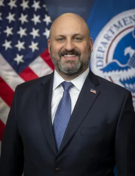 Caption: Bradley Hayes Official Portrait at DHS Headquarters (Photo by Mikaela McGee)