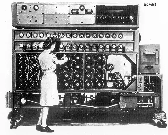 A WAVE operates a code breaking machine known as a bombe at the Naval Communications Annex.  The bombes were built in secrecy by WAVES at the National Cash Register Company in Dayton Ohio and shipped to Washington.  Each 5,000 pound bombe stood seven feet high, ten feet long, and two feet deep. 